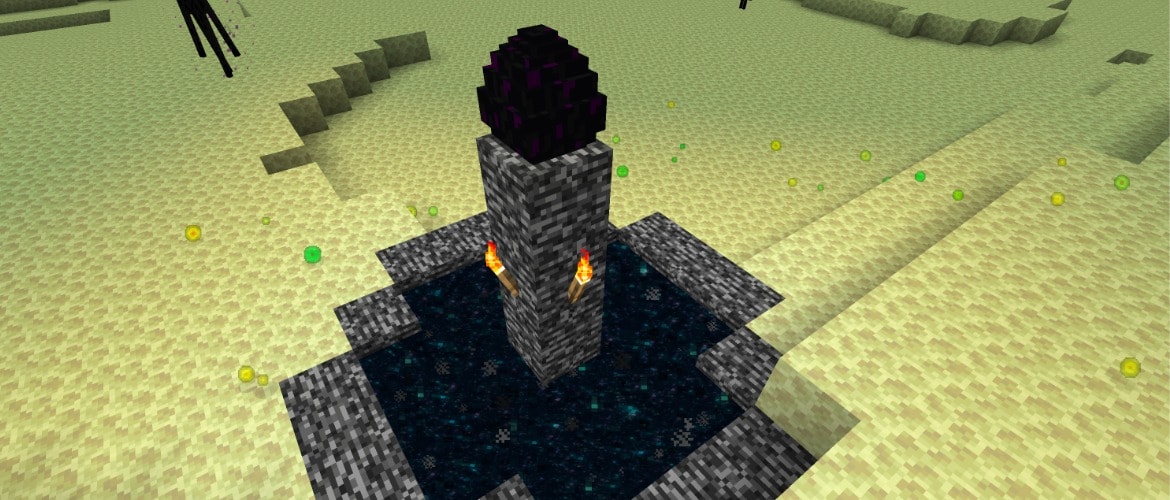 A screenshot of a dragon egg positioned on a pillar in The End dimension.